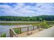Scenic view of the pond with a wooden viewing platform and benches for relaxation at 4140 Candler Lake West Ne, Atlanta, GA 30319