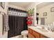 Functional bathroom featuring a shower/tub, storage, and neutral finishes, ensuring a clean and practical space at 461 Mountain View Ln, Woodstock, GA 30188