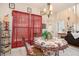 Cozy dining area featuring a charming table setting, bright natural light, and stylish decor at 461 Mountain View Ln, Woodstock, GA 30188