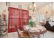 Cozy dining area with a charming table setting and access to the living space at 461 Mountain View Ln, Woodstock, GA 30188