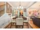 Elegant dining room with stylish chandelier and ample seating for gatherings at 461 Mountain View Ln, Woodstock, GA 30188