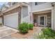 Cozy front porch and inviting doorway showcasing great curb appeal with patriotic decor and landscaping at 461 Mountain View Ln, Woodstock, GA 30188