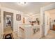 Upstairs hallway leads to rooms and features a decorative stair rail at 461 Mountain View Ln, Woodstock, GA 30188