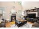 Spacious living room with a cozy fireplace and plenty of natural light at 461 Mountain View Ln, Woodstock, GA 30188