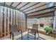 Cozy backyard patio featuring a fire pit, pergola, and fenced privacy, perfect for outdoor entertaining at 461 Mountain View Ln, Woodstock, GA 30188