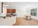 Kitchen and breakfast nook featuring stainless steel appliances and hardwood floors at 718 Surrey Park Se Pl, Smyrna, GA 30082