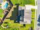 Birds eye view of a beautiful home with a spacious backyard, a swimming pool, and a well-manicured lawn at , Kennesaw, GA 30152