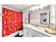 Bathroom with light granite countertops, white cabinetry and a shower with a Christmas tree themed curtain at , Kennesaw, GA 30152