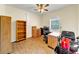 Office with natural light, hardwood floors, ceiling fan, a large desk, and a bookshelf for organizing your documents at , Kennesaw, GA 30152