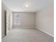 Spacious bedroom with neutral paint, soft carpet, and natural light creating a serene atmosphere at 1250 Parkview Nw Ln, Kennesaw, GA 30152