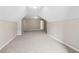 A spacious bonus room is carpeted with neutral walls, great for relaxing or playing games at 1250 Parkview Nw Ln, Kennesaw, GA 30152