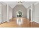 Bright and spacious living room with hardwood floors, columns, and vaulted ceiling at 1250 Parkview Nw Ln, Kennesaw, GA 30152