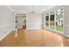 Open living area with hardwood floors, large windows, and ample natural light at 1250 Parkview Nw Ln, Kennesaw, GA 30152