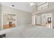 Open-concept living room with a fireplace and an office space nearby at 1250 Parkview Nw Ln, Kennesaw, GA 30152