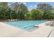 Large community pool with lounge chairs, umbrellas, and easy access at 1250 Parkview Nw Ln, Kennesaw, GA 30152