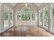 Lovely sunroom featuring tile floors and multiple windows for ample natural light at 1250 Parkview Nw Ln, Kennesaw, GA 30152