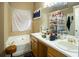 Bathroom vanity with double sinks with ample counter space, with a tub in the background at 1312 Glenover Way, Marietta, GA 30062