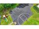Community basketball court with a playground, offering residents recreational opportunities at 1592 Walkway Ct, Lilburn, GA 30047