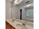 Bathroom featuring a double vanity, a large mirror, and a tub at 1592 Walkway Ct, Lilburn, GA 30047