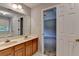 Bathroom with double sinks and a tub/shower combination viewed from doorway at 1592 Walkway Ct, Lilburn, GA 30047