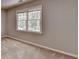 Bedroom featuring a large window at 1592 Walkway Ct, Lilburn, GA 30047