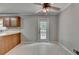 View of the dining room with gray walls, neutral floors and a door leading to an outside deck at 1592 Walkway Ct, Lilburn, GA 30047