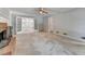 Spacious living room with fireplace and view to hall at 1592 Walkway Ct, Lilburn, GA 30047