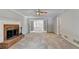Spacious living room featuring a fireplace at 1592 Walkway Ct, Lilburn, GA 30047