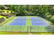 A well-maintained community tennis court provides an excellent recreation option for residents at 1592 Walkway Ct, Lilburn, GA 30047
