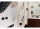 Bathroom features a tub, shower, a stylish vanity, and tile flooring at 10044 Cormac St, Jonesboro, GA 30238