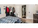 Bedroom featuring bed, dresser, and decor at 10044 Cormac St, Jonesboro, GA 30238