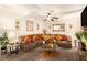 Inviting living room with a large sectional, stone-accented fireplace, and a warm, comfortable atmosphere at 10044 Cormac St, Jonesboro, GA 30238