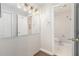Updated bathroom with modern lighting and a view to the shower at 3201 Lenox Ne Rd # 23, Atlanta, GA 30324
