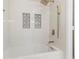 Clean bathroom with new white shower and modern finishes at 3201 Lenox Ne Rd # 23, Atlanta, GA 30324