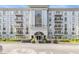 Beautiful condominium complex featuring a well maintained facade and manicured landscaping at 3201 Lenox Ne Rd # 23, Atlanta, GA 30324