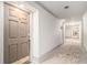Hallway shot featuring carpet with design and door to unit number 23 at 3201 Lenox Ne Rd # 23, Atlanta, GA 30324
