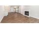 Bright living room featuring hardwood floors and a fireplace at 3201 Lenox Ne Rd # 23, Atlanta, GA 30324