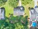 Aerial view of property showcasing its expansive lot and swimming pool at 40 Queensland Ln, Covington, GA 30016