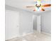 Bedroom with overhead ceiling fan and lighting plus dual closets at 40 Queensland Ln, Covington, GA 30016