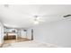 Open concept floor plan with the kitchen breakfast bar overlooking the living room at 40 Queensland Ln, Covington, GA 30016
