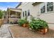 Backyard showcasing raised garden beds and an outdoor seating area at 4395 Capstone Court, Roswell, GA 30075