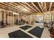 Unfinished basement with exposed ceiling, open layout, and framing, offering potential for customization at 4395 Capstone Court, Roswell, GA 30075