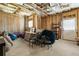 Unfinished basement with exposed ceiling, window, and door, ready for customization and ample storage at 4395 Capstone Court, Roswell, GA 30075
