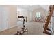 This carpeted bonus room features lots of space, good lighting, and neutral colored walls at 17 Sassafras Ne Trl, Cartersville, GA 30121