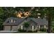 Charming home with a two-car garage, dormer windows, and a beautifully manicured lawn at 17 Sassafras Ne Trl, Cartersville, GA 30121