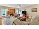 Relaxing living room with built-in shelves, a fireplace, and a comfortable leather sectional at 17 Sassafras Ne Trl, Cartersville, GA 30121