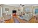Cozy living room with a comfortable recliner, a sectional sofa, and an entertainment center at 17 Sassafras Ne Trl, Cartersville, GA 30121