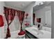 Bathroom featuring a single sink vanity with stylish, decorative curtains at 2639 Cooper Brook Dr, Snellville, GA 30078