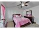 Cozy bedroom with a plush bed, dresser, and a bright window, creating a comforting retreat at 2639 Cooper Brook Dr, Snellville, GA 30078