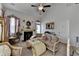 Formal living room with high ceilings, decorative fireplace, and elegant furnishings at 2639 Cooper Brook Dr, Snellville, GA 30078